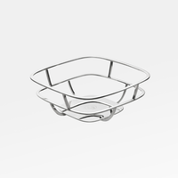The Christofle Silver Time Bread Basket features a polished silver-plated finish, a square opening, and a double-layered wavy base—ideal as an eye-catching fruit basket centerpiece.