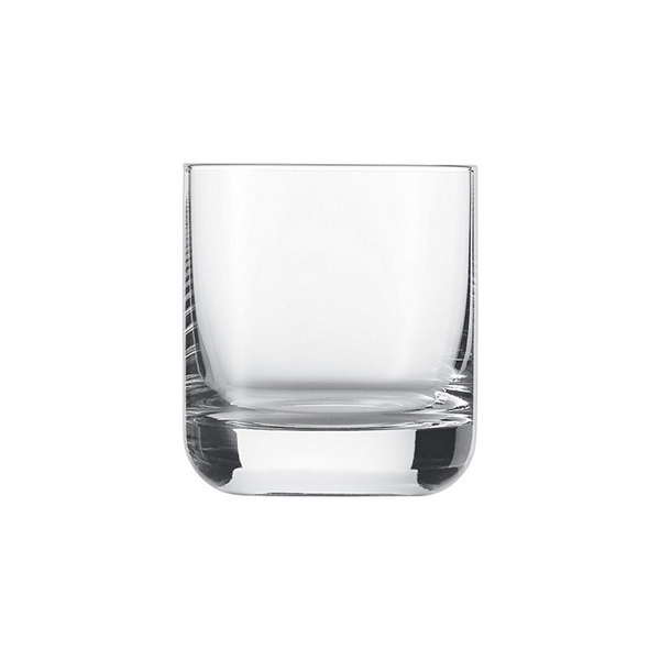 A clear, empty Zwiesel Fortessa Whiskey Glass from the Simple Set of 6, featuring a robust design and thick base, is centered on a plain white background.