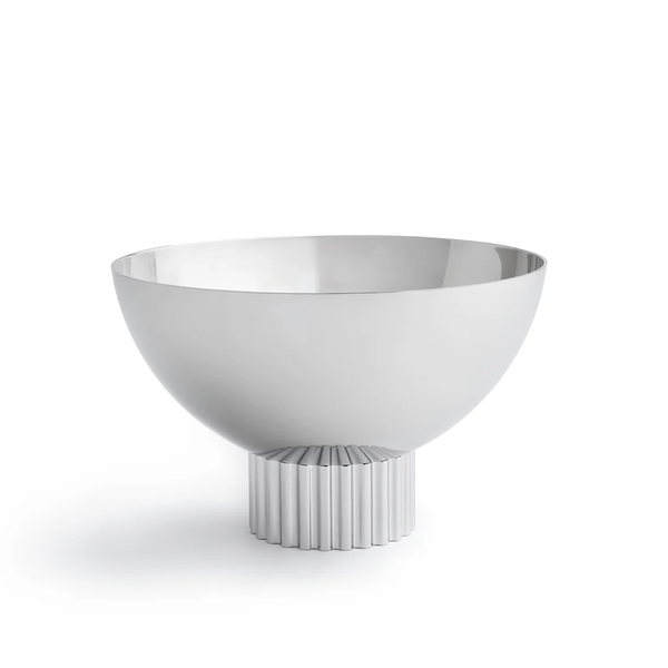 The Striations Silver Nut Bowl by Anna New York features a modern, shiny stainless steel design with a wide, round shape and fluted cylindrical base, shown against a plain white background.