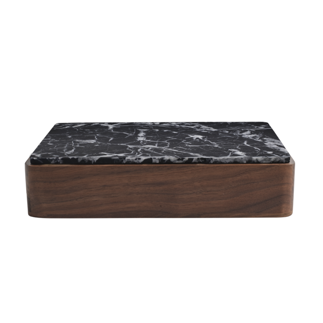 The Terreno Box by Greg Natale features a dark wood base and a black marble-patterned lid, showcased against a white background.