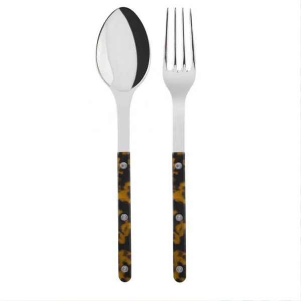 The Sabre Bistrot Shiny Solid Serving Set includes a stainless steel spoon and fork with glossy dark brown and black tortoiseshell-patterned handles, each accented by three silver rivets, shown on a white background.
