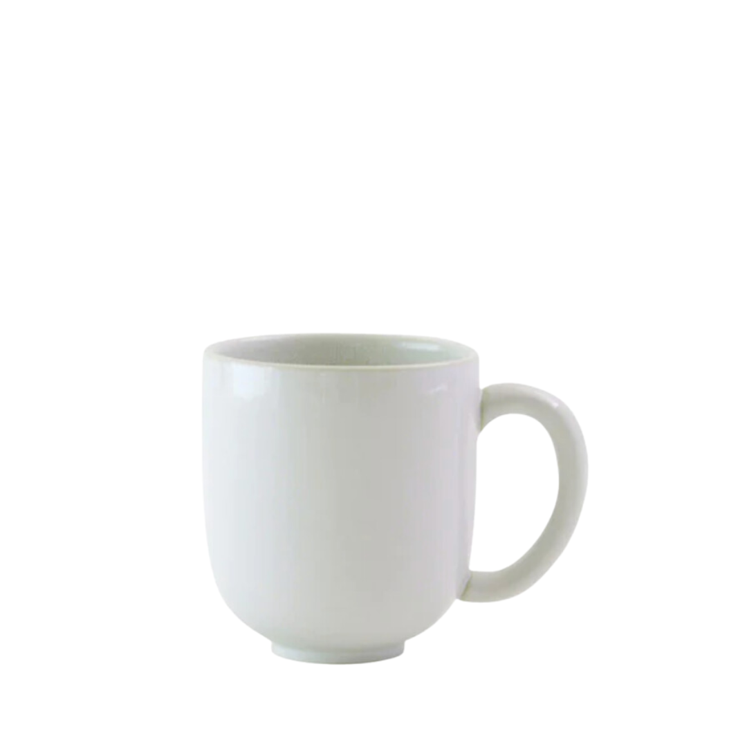 A white ceramic mug with a handle from the Jars - Rosenthal Tourron Dinnerware Neige collection, shown on a white background.