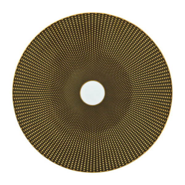 The Tresor Dinnerware Brown round plate by Raynaud features a brown and gold geometric dot pattern radiating from a white center, offering an elegant touch to formal dinnerware settings.
