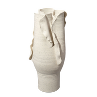 The Tublar Vase by Jamie Young features a tall, cream ceramic form with wavy edges and a textured surface, evoking flowing fabric for an organic, statement-making design.