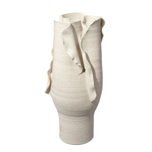 The Tublar Vase by Jamie Young features a tall, cream ceramic form with wavy edges and a textured surface, evoking flowing fabric for an organic, statement-making design.