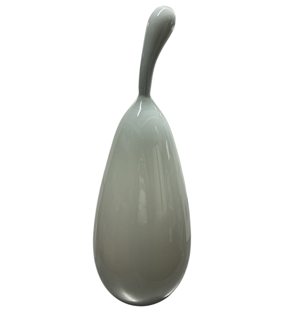 The Volume Vessel Dove Grey by Tyler Barry Design is a smooth, glossy handblown glass sculpture with an elongated, curved stem, serving as a striking sculptural accent against a plain white background.