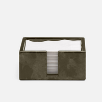 The Blue Pheasant Nelson Vellum Grey Cocktail Napkin Holder, shown with white napkins against a light background, makes an ideal home bar accessory.