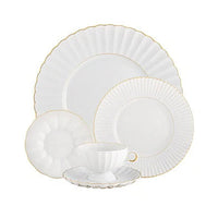 The Vista Alegre 200 Anos Dinnerware set features white porcelain with scalloped edges, hand-painted gold trim, and modern elegance. Includes dinner plate, salad plate, bread plate, teacup, and saucer—all displayed on a white background.