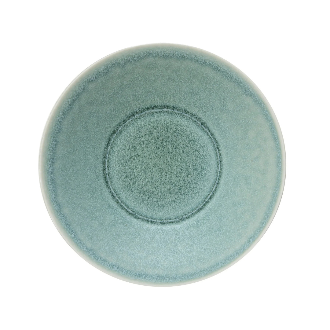 The Vuelta Nori by Jars - Rosenthal is a round ceramic dinnerware plate featuring a textured, mottled turquoise surface and a raised circular center pattern—ideal for modern everyday use.