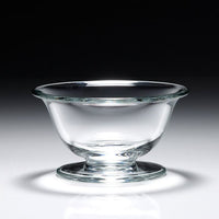 The William Yeoward Alice Bowl, a clear handmade crystal piece with a wide rim and short pedestal base, adds Georgian-inspired elegance to any dessert presentation.