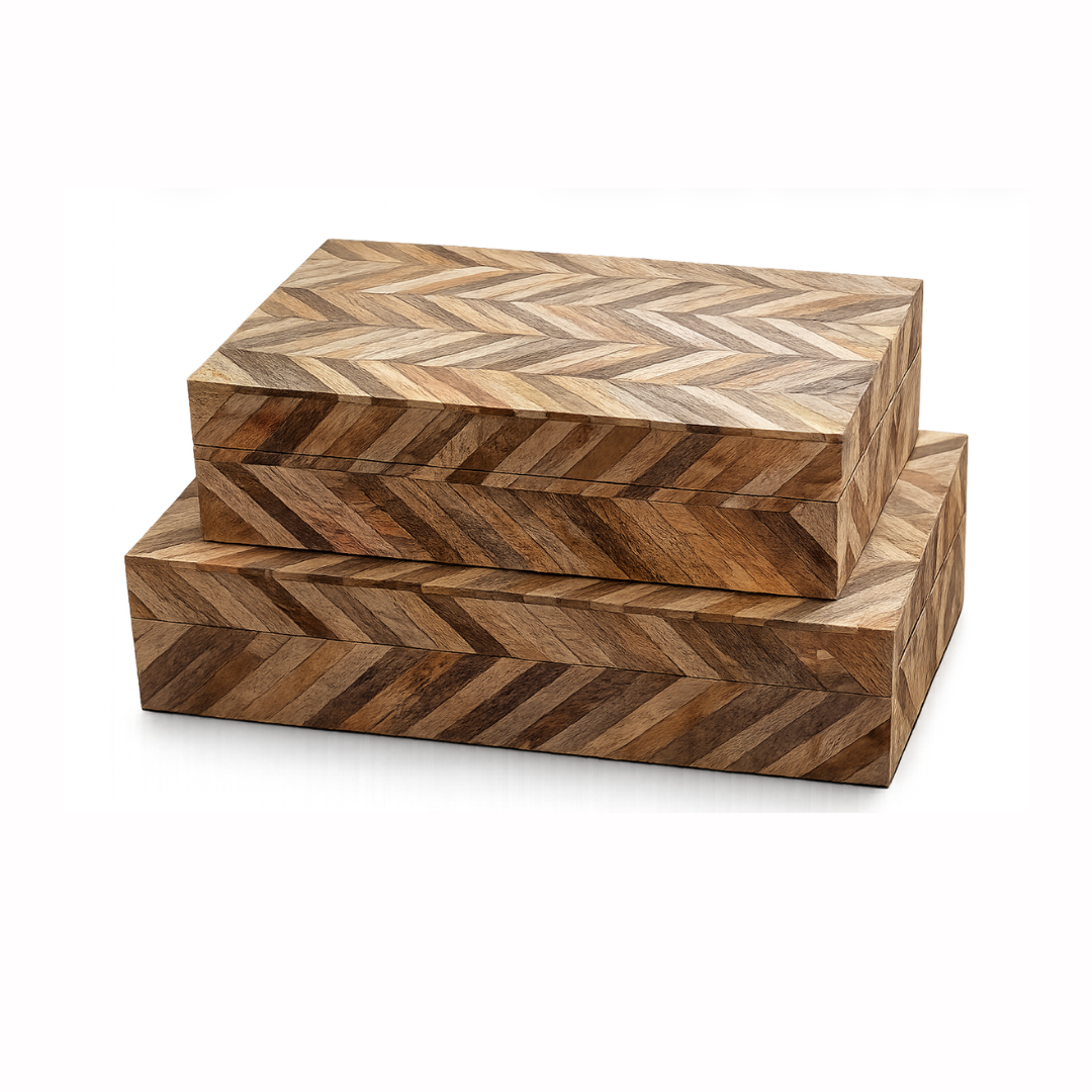 Two rectangular Modular Boxes by Bojay, featuring striking chevron-patterned surfaces and natural wood tones, are stacked neatly on top of each other against a white background, beautifully highlighting their geometric designs and artisanal craftsmanship.