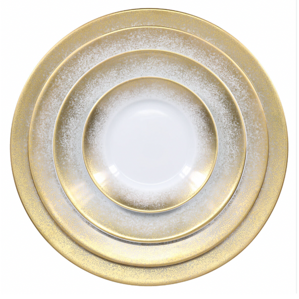 The Royal Limoges Yellow Fire Dinnerware set features three round Limoges porcelain plates with white centers and sparkling yellow gold rims, stacked from largest to smallest against a white background.