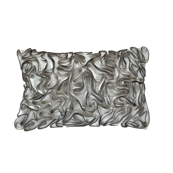 The Threads Soft Goods Zipper Pillow Natural 13 x 20 is a rectangular, handcrafted pillow with a white base and textured black embroidered wavy lines and loops in an abstract ribbon pattern.