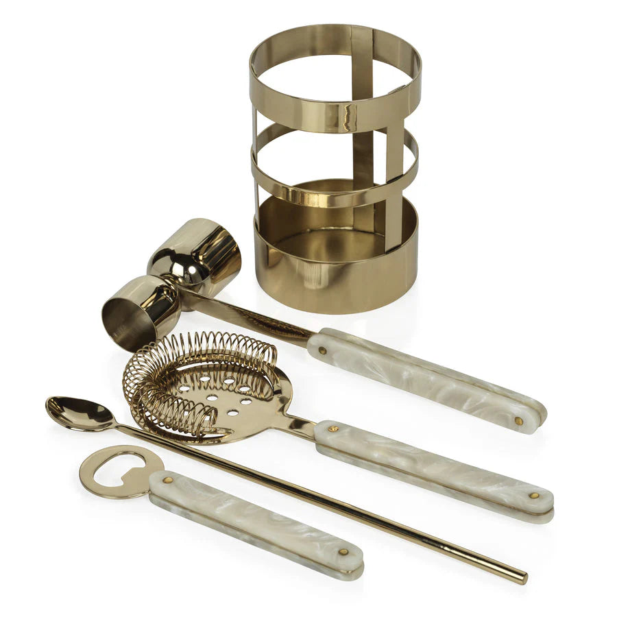 The Zodax Armor Gold 5 Piece Bar Set includes a gold and white cocktail set with a cylindrical holder, jigger, strainer, mixing spoon, and bottle opener—all featuring elegant gold metal and white marbled handles.