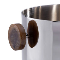 The Spector Ice Bucket by Zodax features a polished nickel finish and a striking amber marbled resin handle—ideal for stylish bar entertaining.