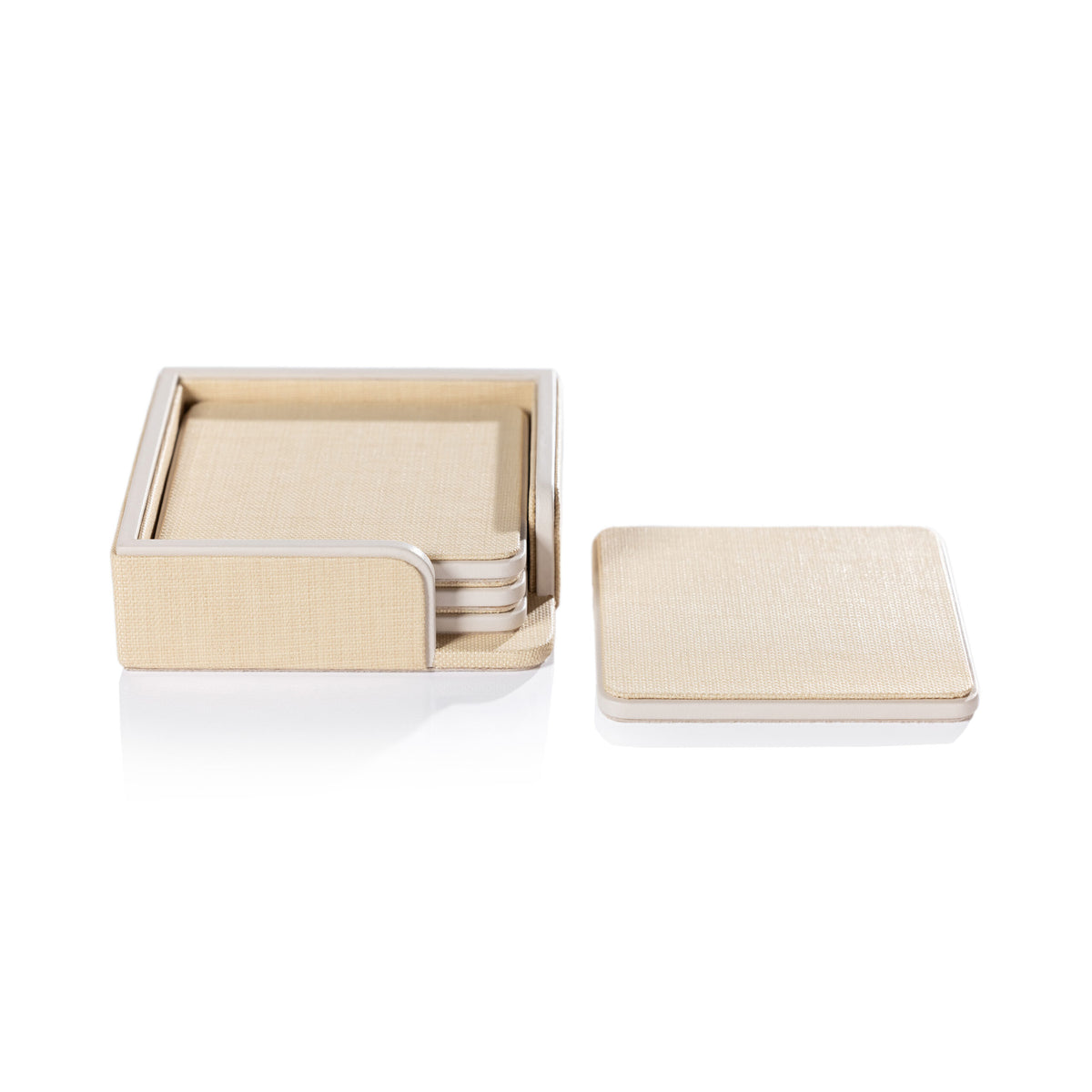The Zodax Napoli Leather Coaster Set of 4 in Raffia & Cream features beige-textured coasters neatly stacked in a matching holder, with one displayed outside, all on a white background.