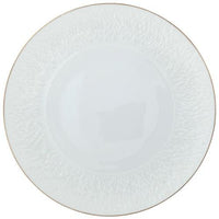 The Mineral Irise Gold Filet Dinnerware by Raynaud, shown from above on a plain background, features white porcelain with a subtle textured rim and gold edge—a refined example of contemporary plate design.