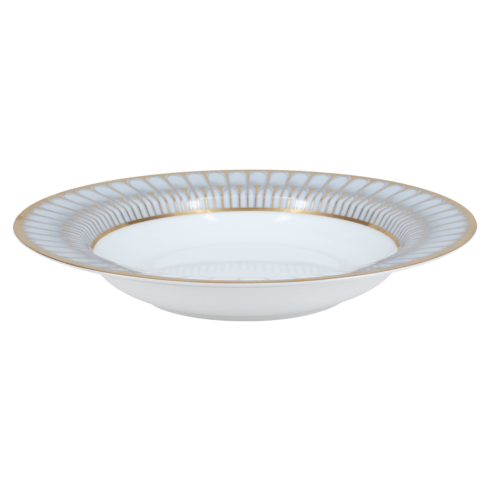 A white porcelain soup plate with a wide rim, adorned with an elegant light blue and gold pattern inspired by Philippe Deshoulieres' Arcades Gold Dinnerware.