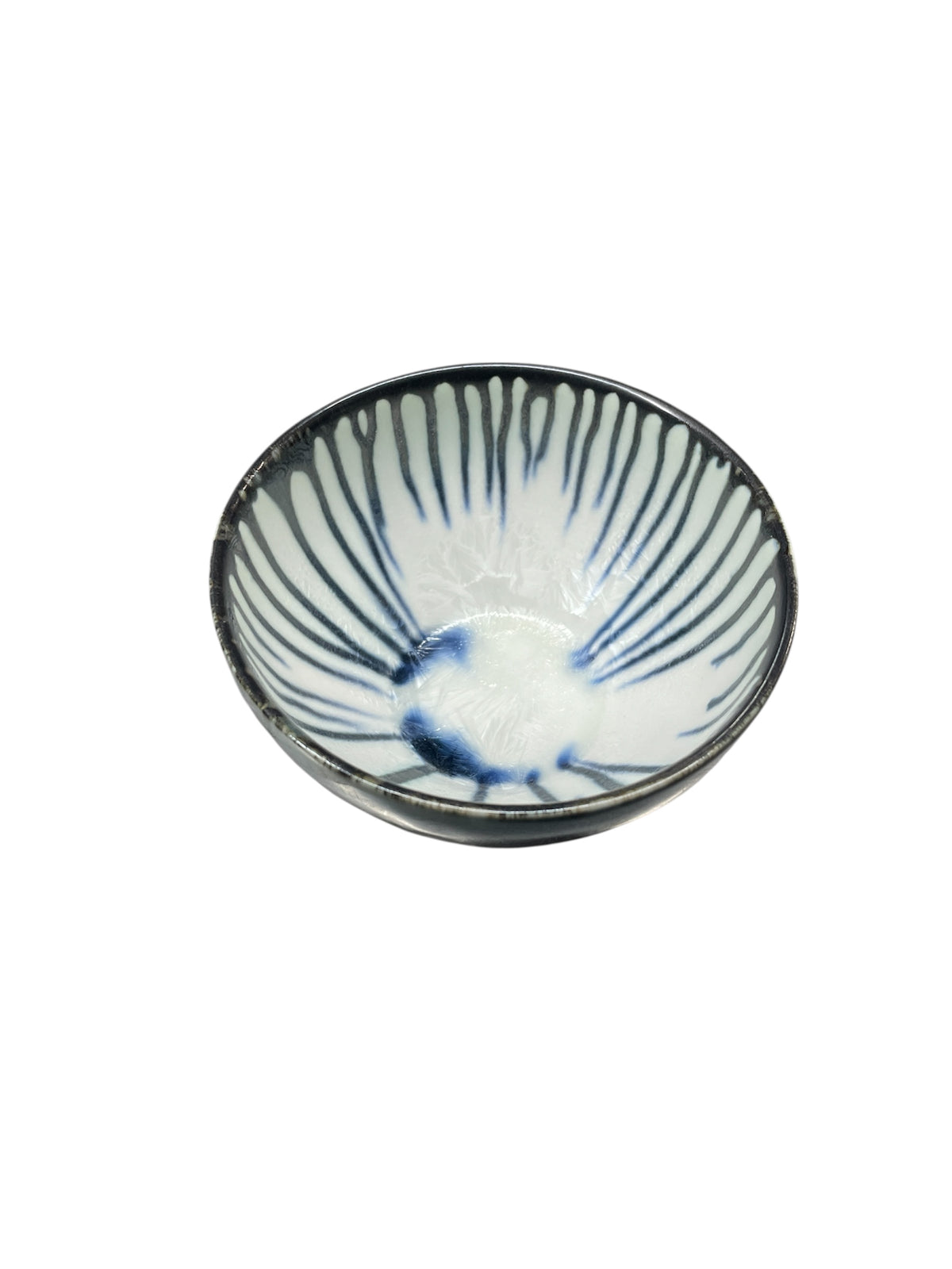 The Borealis Dip Bowl - Black & White Drip by Michael Wainwright features a shallow ceramic design with a white interior, black drip detailing, and a plain white background.