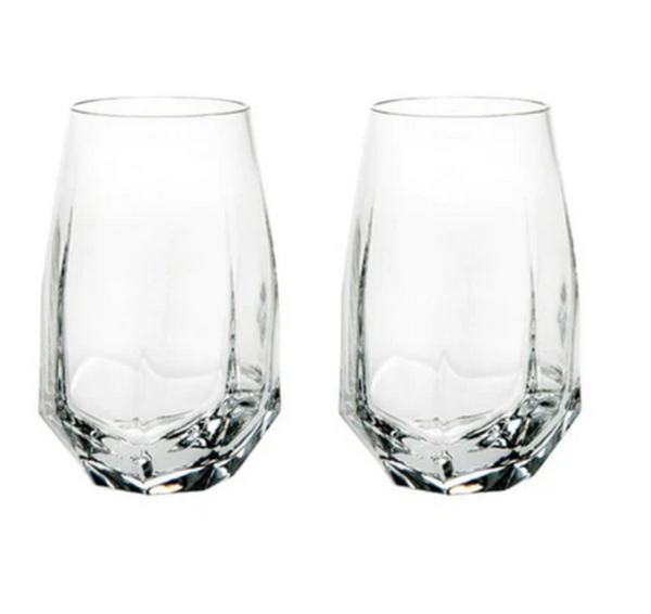 The Gemstone Highball Set of 2 by Vista Alegre features modern, geometric glasses with thick bases and faceted clear glass. Stylish and contemporary, these dishwasher-safe tumblers are perfect for any setting.