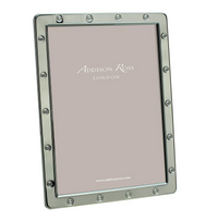 The Addison Ross Locket Frame Silver features a studded border, plush velvet backstand, and displays an insert reading "Addison Ross" with www.addisonross.com at the bottom.