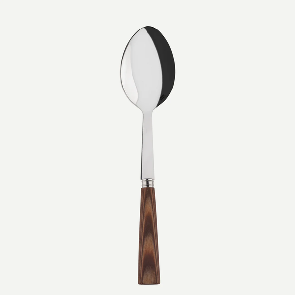 The Sabre Nature Serving Spoon features a shiny stainless steel bowl and chocolate-colored wood handle, shown on a white background—ideal for serving side dishes.