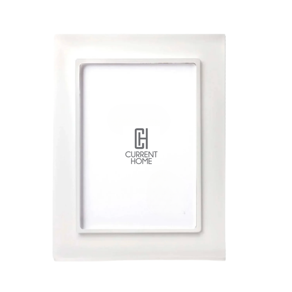 The Prisma Frame Snow White by Bella Moulding is a white, rectangular frame with a glossy finish and high-quality acrylic, shown with a placeholder insert featuring the Current Home logo centered on a plain white background.