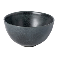The Livia Dinnerware Matte Black bowl by Casafina/Costa Nova features a slightly textured, matte ceramic finish and rounded shape, part of their modern Portuguese collection, shown on a white background.