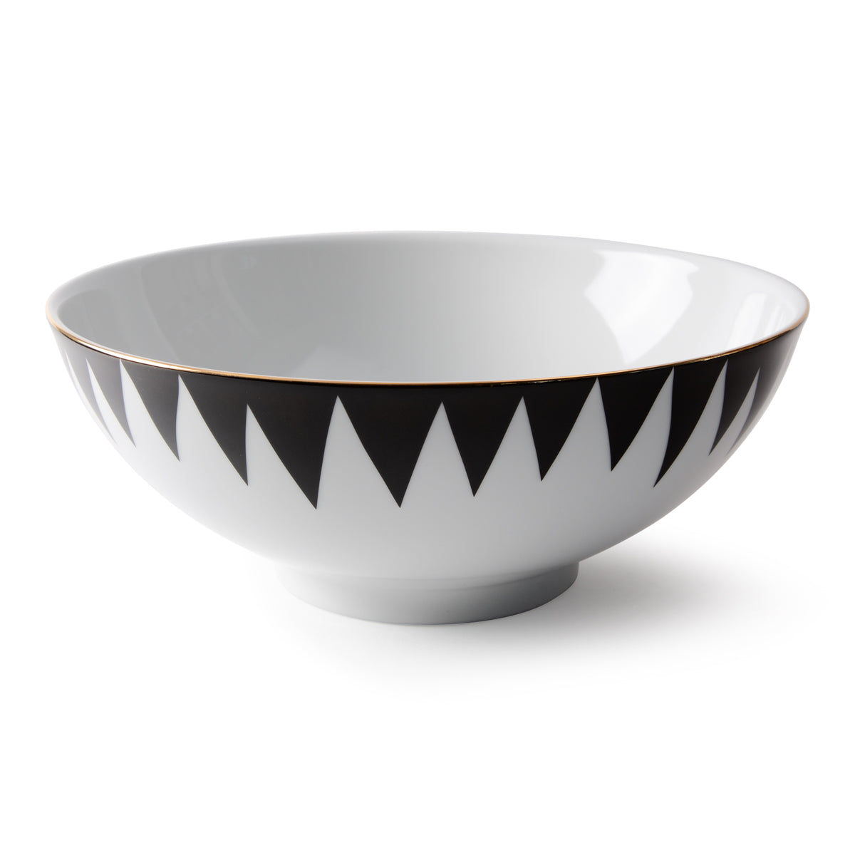 The Punk Dinnerware by Molecot is a white ceramic bowl with a black zigzag rim and thin gold edge, crafted as modern tableware and shown on a plain white background.