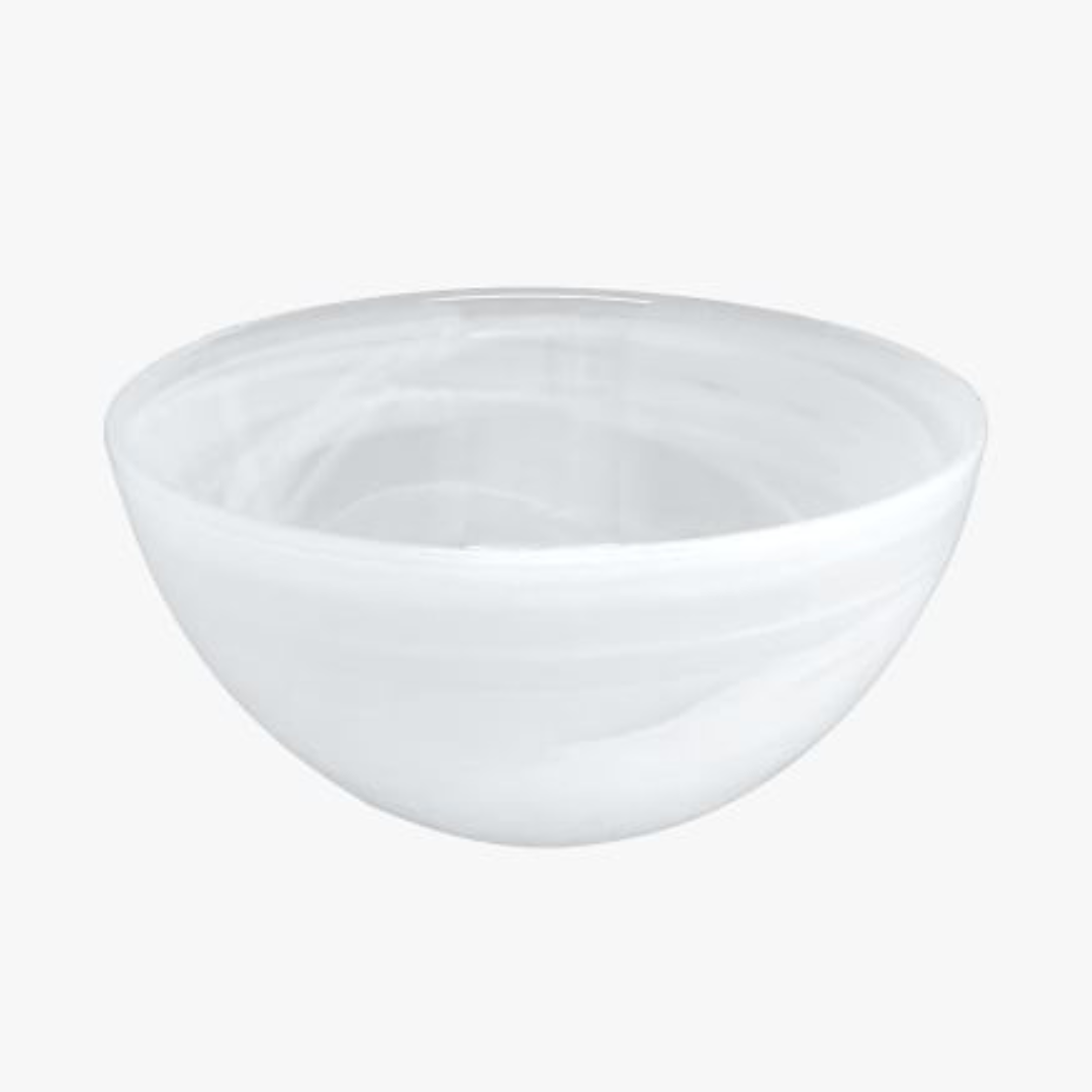 A round, white, semi-translucent bowl from the Mariposa Swirl Alabaster Dinnerware White Set of 4 features a smooth surface and is displayed on a plain light background.