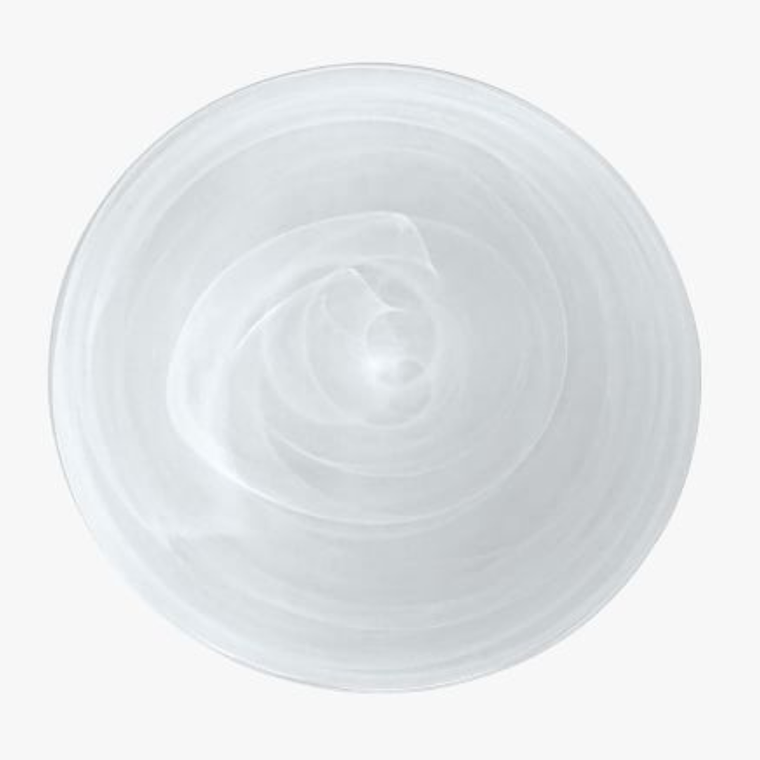 A creamy swirl sits on a Mariposa Swirl Alabaster Dinnerware White plate, part of the set of 4, captured from above against a white background.