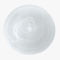 A creamy swirl sits on a Mariposa Swirl Alabaster Dinnerware White plate, part of the set of 4, captured from above against a white background.