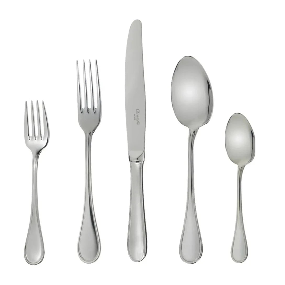 The Christofle Albi Acier Flatware 5 Piece Setting in stainless steel includes a salad fork, dinner fork, dinner knife, soup spoon, and teaspoon, each with simple polished handles for an elegant table.