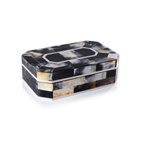 The Zodax Villagio Horn Box Black & Ivory features a handcrafted rectangular design with an octagonal lid, inlaid black and tan horn mosaic, and elegant white ivory trim.