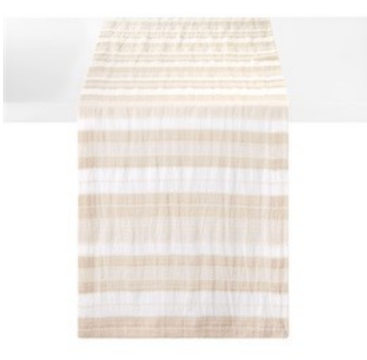 The Bodrum Aegean Stripe Runner 90" in beige features alternating horizontal stripes in a soft, neutral palette, draped over a white table for an elegant touch.
