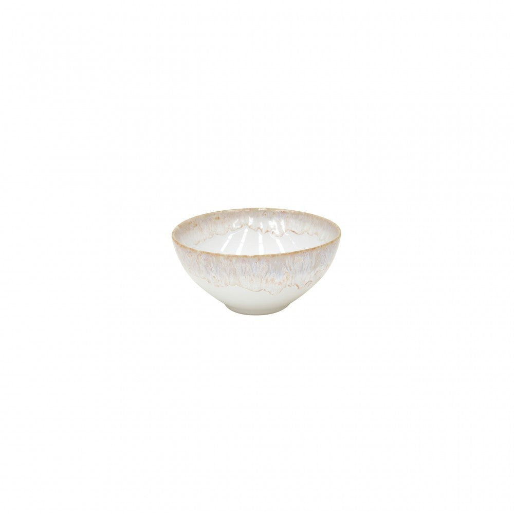 The Casafina Taormina Dinnerware White is a small, round ceramic bowl from Portugal with a light speckled glaze and subtly textured rim, presented on a plain white background.