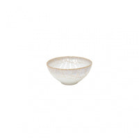 The Casafina Taormina Dinnerware White is a small, round ceramic bowl from Portugal with a light speckled glaze and subtly textured rim, presented on a plain white background.