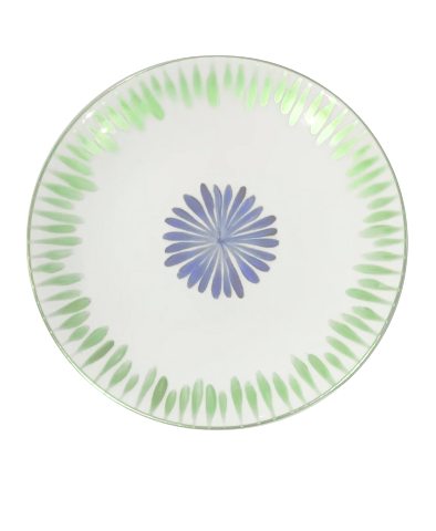 The Marie Daâge Marie Daage Allee de Cypres 4 plate is a round white Limoges porcelain piece adorned with a central blue radial flower and border of green leaf motifs, exemplifying exquisite luxury tableware.