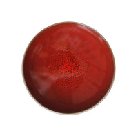 The Tourron Dinnerware Cerise plate by Jars - Rosenthal features a round ceramic shape, glossy red finish, pretty glazes, and a crackled center pattern, shown from above on a white background.
