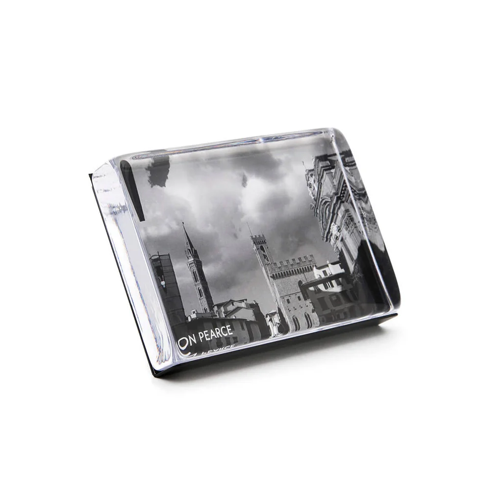 Glass tray with black and white cityscape design on a light gray background