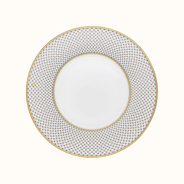 The Mottahedeh/Robert Haviland Home Dinnerware- Gold is a round white plate featuring a wide, intricate gold and gray geometric rim and a thin gold edge, shown from above against a plain background.