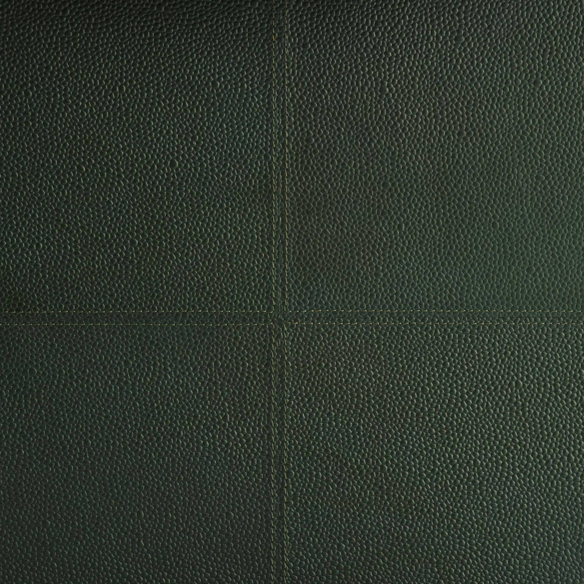 The Stohlman Tray by Arteriors features a dark green textured surface with a premium embossed leather pattern and stitched lines dividing it into four sections—ideal as a modern tray or decorative organizer.