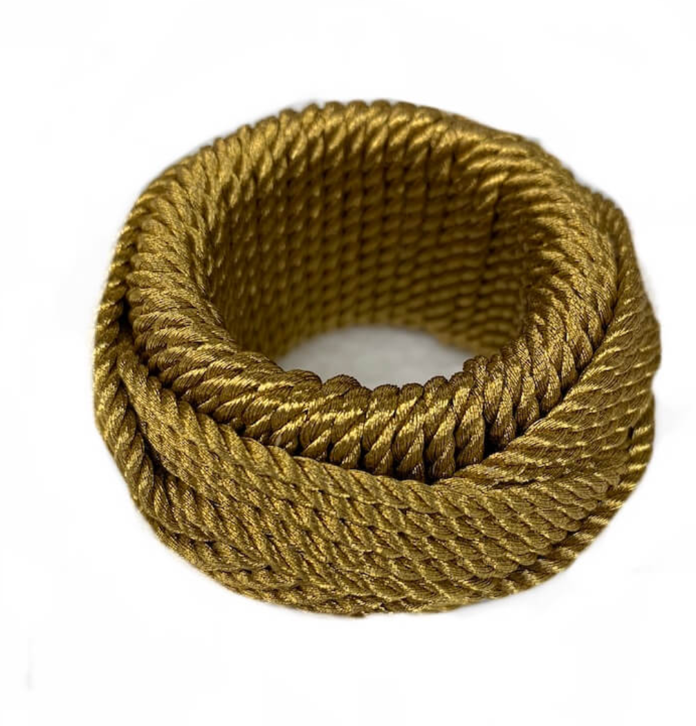Four thick, coiled golden Rope Napkin Rings from Von Gern Home are neatly wound into circular shapes on a white background, each piece adding a touch of sophistication to any elegant table setting.