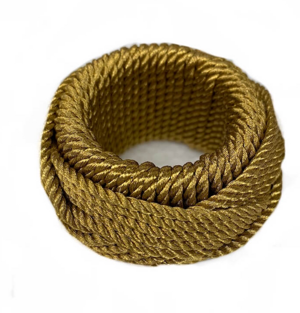 Four thick, coiled golden Rope Napkin Rings from Von Gern Home are neatly wound into circular shapes on a white background, each piece adding a touch of sophistication to any elegant table setting.