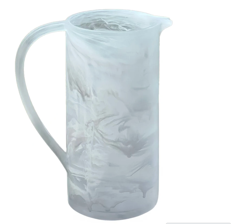 Dawn Resin Swirl Pitcher in white, featuring a cylindrical shape with a marbled gray swirl pattern and a curved handle.