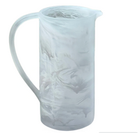 Dawn Resin Swirl Pitcher in white, featuring a cylindrical shape with a marbled gray swirl pattern and a curved handle.