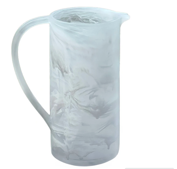Dawn Resin Swirl Pitcher in white, featuring a cylindrical shape with a marbled gray swirl pattern and a curved handle.
