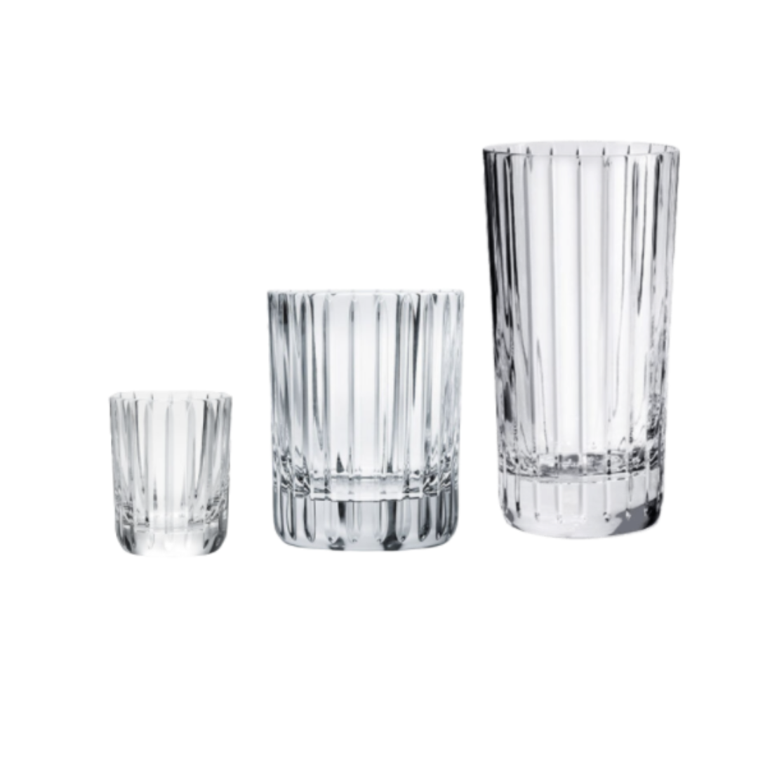 Two clear, vertically ribbed Baccarat Harmonie glasses from Baccarat's Barware Set of 2 are displayed side by side against a white background.