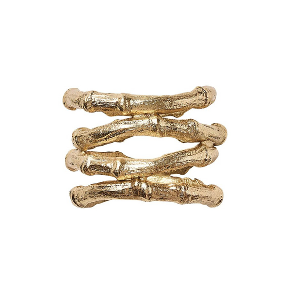 The Kim Seybert Bamboo Napkin Ring Gold Set of 4 features gold-plated rings designed to resemble three textured faux bamboo stalks stacked together, each with a detailed, organic finish.