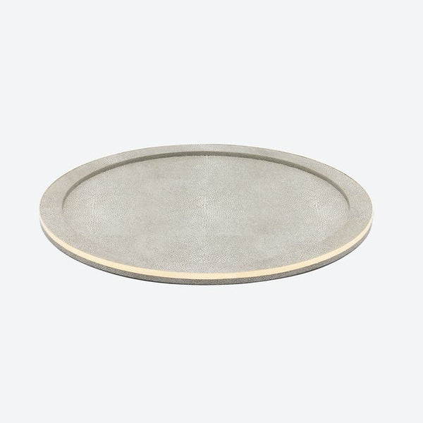 The Blue Pheasant Langston Round Tray - Sand / Gold is a round serving tray with a flat sand faux shagreen surface, a thin gold edge, and a slightly raised rim, shown on a plain light background.